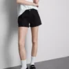 Pantalones Cortos vaqueros de talle medio con vuelta