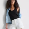 Pantalones Cortos vaqueros de talle medio con vuelta