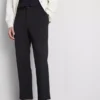 Pantalones de corte regular «The Edit»