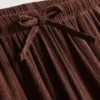 Pantalones de pierna ancha con efecto arrugado