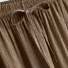 Pantalones de pierna ancha con efecto arrugado