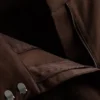 Pantalones de pierna ancha con pliegues y detalle de cinturón