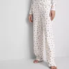 Pantalones de pijama de canalé con estampado de mariposas