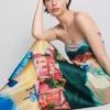 Pantalones de playa de satén con estampado panorámico