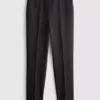 Pantalones elásticos con pliegues y talle medio