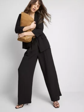 Pantalones holgados con textura y cintura media