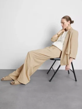 Pantalones holgados con textura y cintura media