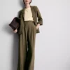 Pantalones holgados con textura y cintura media