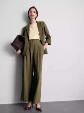 Pantalones holgados con textura y cintura media