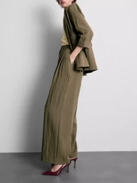 Pantalones holgados con textura y cintura media