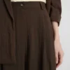 Pantalones holgados con textura y cintura media