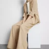 Pantalones holgados con textura y cintura media
