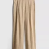 Pantalones holgados con textura y cintura media