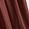 Pantalones holgados con textura y cintura media