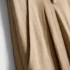 Pantalones holgados con textura y cintura media