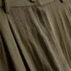 Pantalones holgados con textura y cintura media