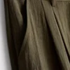 Pantalones holgados con textura y cintura media