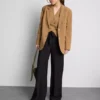 Pantalones palazzo con detalle de lazo