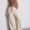 Pantalones palazzo con detalle de lazo