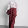 Pantalones palazzo con detalle de lazo