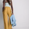 Pantalones palazzo con detalle de lazo