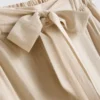 Pantalones palazzo con detalle de lazo
