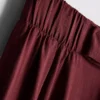 Pantalones palazzo con detalle de lazo