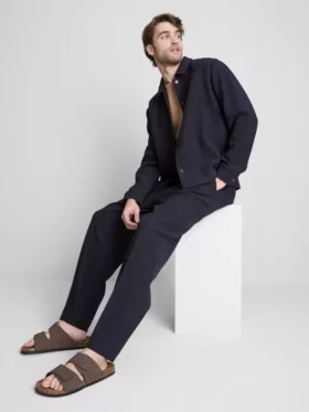 Pantalones plisados «The Edit»