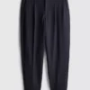 Pantalones plisados «The Edit»