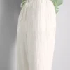 Pantalones rectos arrugados
