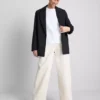 Pantalones utilitarios de corte acampanado con alto contenido en algodón