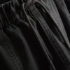 Pantalones utilitarios de pierna ancha con detalle en las costuras