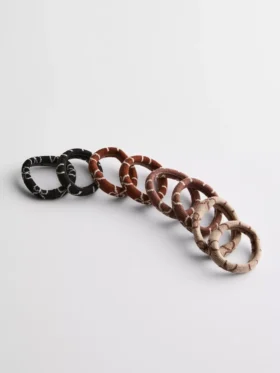 Paquete de 8 gomas para el pelo con estampado de lazos