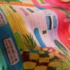 Pareo con flecos y estampado tropical