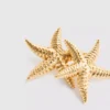 Pendientes de botón con forma de estrella de mar