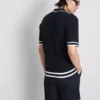 Polo con cremallera y textura «The Edit»