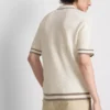 Polo con cremallera y textura «The Edit»