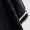 Polo con cremallera y textura «The Edit»