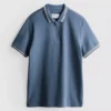 Polo con cuello de cremallera y textura