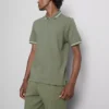Polo con cuello de cremallera y textura
