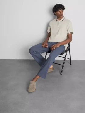 Polo con cuello de cremallera y textura