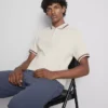 Polo con cuello de cremallera y textura