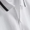 Polo con cuello de cremallera y textura