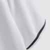 Polo con cuello de cremallera y textura