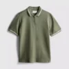 Polo con cuello de cremallera y textura