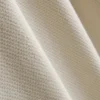 Polo con cuello de cremallera y textura