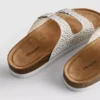 Sandalias con plantilla adornada y doble hebilla