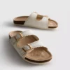 Sandalias con plantilla con detalles cortados a láser