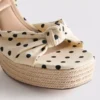 Sandalias de plataforma con detalle de nudo
