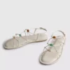 Sandalias de tiras con abalorios